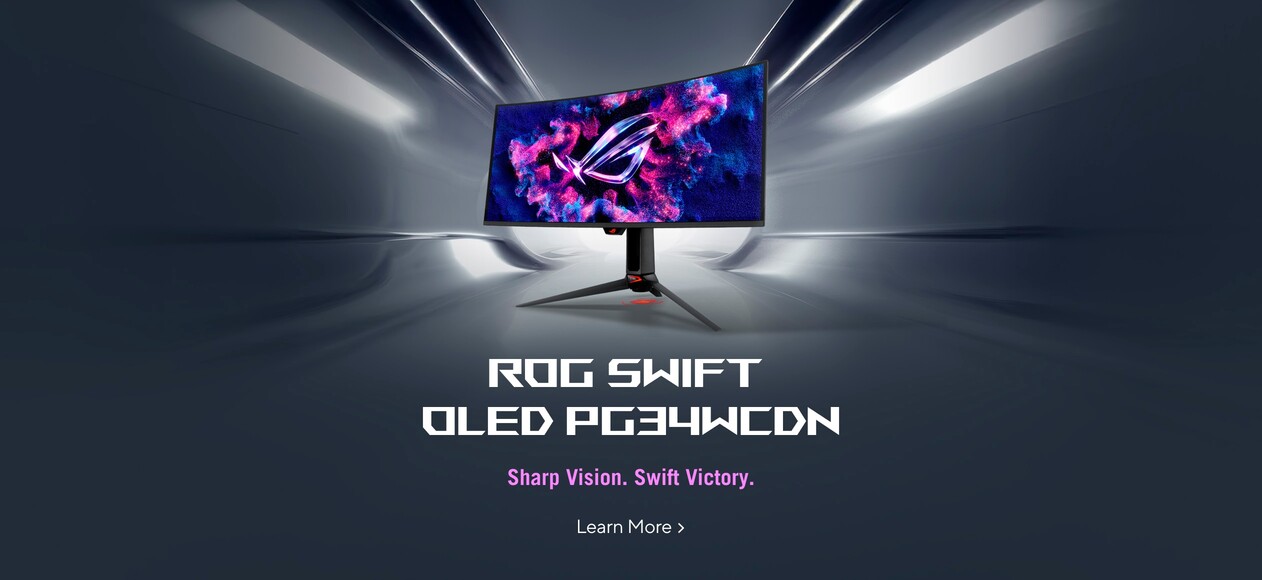 Curved ROG Swift OLED PG34WCDM monitor displaying a blue-pink nebula graphic, positioned on a stand inside a smooth metallic tunnel.